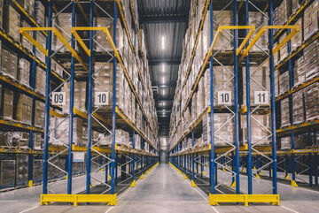Arvato high bay warehouse filled with pallets
