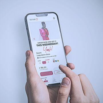 A smartphone showing a product in an online store with the text 