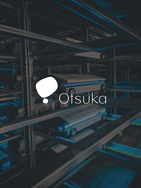A warehouse shuttle system for order fulfillment on the picture is a logo of the customer otsuka